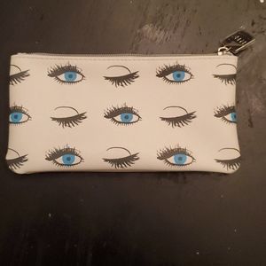 R+F winking eye makeup bag